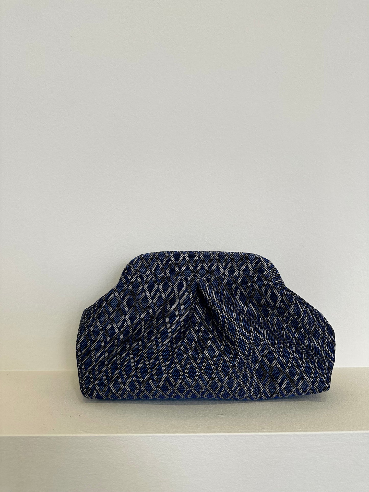 Denim print clutch