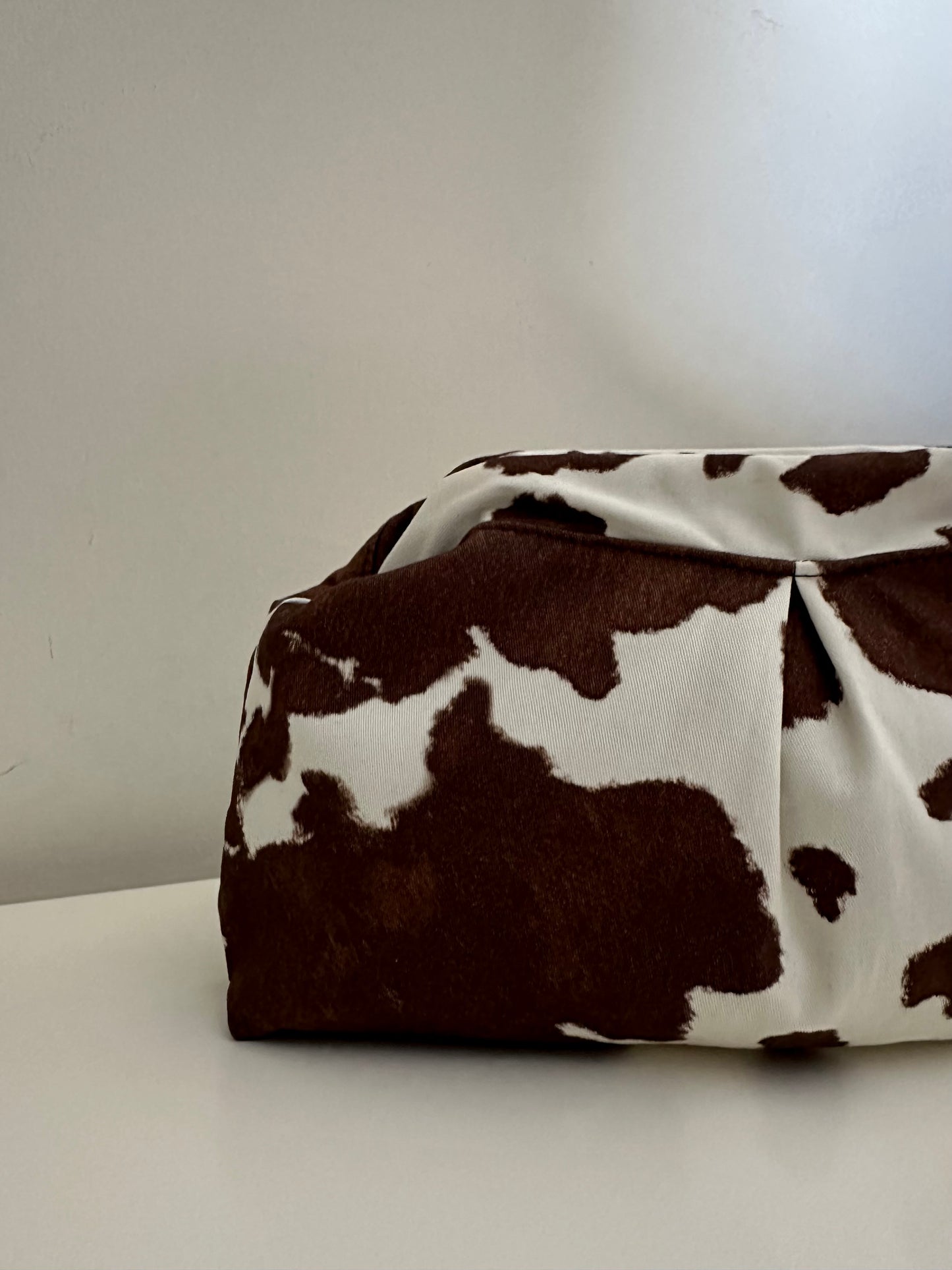 Cow print clutch
